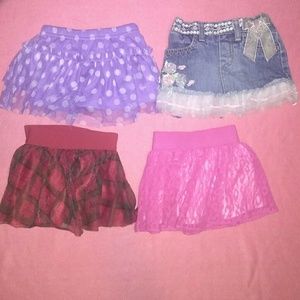 4 baby girl skirts. 12m